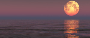 Red moon over the sea